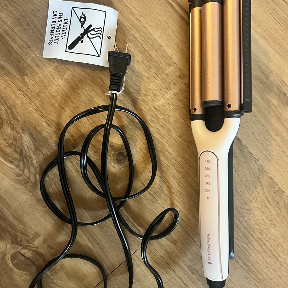 Remington Pro 4-in-1
Adjustable Waver/
Crimper